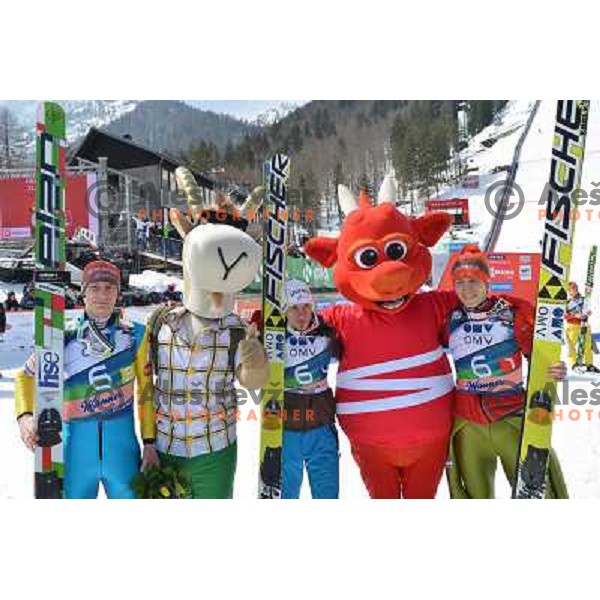 Andraz Pograjc, Robert Kranjec and Jurij Tepes of Slovenia during team competition at FIS Ski jumping World Cup Final in Planica, Slovenia on March 23, 2013 