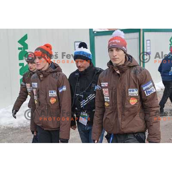 Peter Prevc, Tomi Trbovc and Jurij Tepes of Slovenia during team competition at FIS Ski jumping World Cup Final in Planica, Slovenia on March 23, 2013 