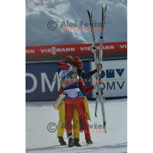 Andraz Pograjc and Peter Prevc of Slovenia during team competition at FIS Ski jumping World Cup Final in Planica, Slovenia on March 23, 2013 