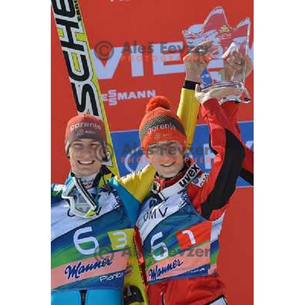 Andraz Pograjc and Jurij Tepes,of Slovenia during team competition at FIS Ski jumping World Cup Final in Planica, Slovenia on March 23, 2013 