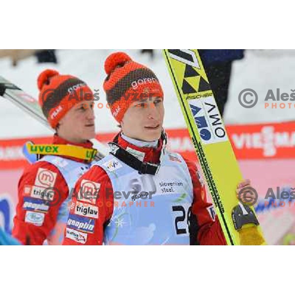 Jurij Tepes and Peter Prevc of Slovenia during final competition at FIS Ski jumping World Cup Final in Planica, Slovenia on March 24, 2013 