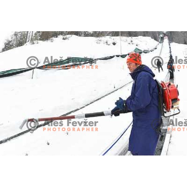 Workers during final competition at FIS Ski jumping World Cup Final in Planica, Slovenia on March 24, 2013 