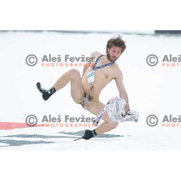 Naked fan during final competition at FIS Ski jumping World Cup Final in Planica, Slovenia on March 24, 2013 