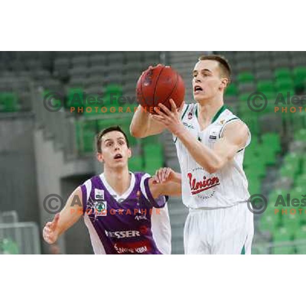 Jure Pelko of Maribor Messer and Klemen Prepelic of Union Olimpija in action during basketball match Union Olimpija-Maribr Messer in fourth round of Telemach league, played in Arena Stozice, Ljubljana, Slovenia on April 3 ,2013 