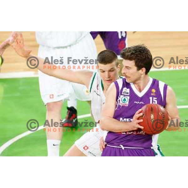 Dino Muric of Union Olimpija and Elvis Sarkinovic of Maribor Messer in action during basketball match Union Olimpija-Maribr Messer in fourth round of Telemach league, played in Arena Stozice, Ljubljana, Slovenia on April 3 ,2013 
