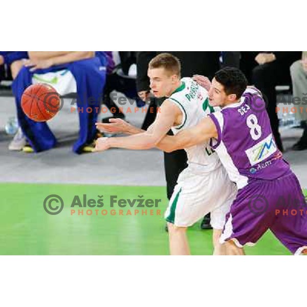 Klemen Prepelic of Union Olimpija and Marko Cej of Maribor Messer in action during basketball match Union Olimpija-Maribr Messer in fourth round of Telemach league, played in Arena Stozice, Ljubljana, Slovenia on April 3 ,2013 