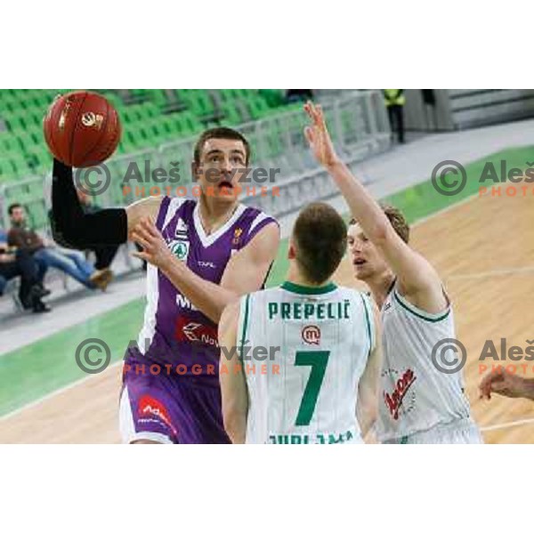 Igor Maric of Maribor Messer and Klemen Prepelic, Jaka Blazic of Union Olimpija in action during basketball match Union Olimpija-Maribr Messer in fourth round of Telemach league, played in Arena Stozice, Ljubljana, Slovenia on April 3 ,2013 