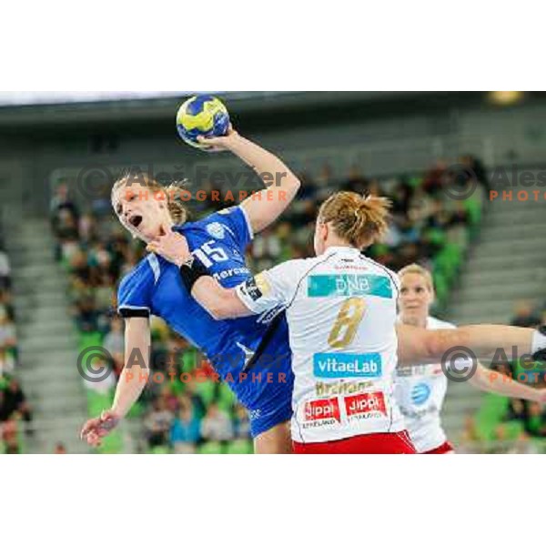 Barbara Lazovic of Krim Mercator and Karoline Breivang of Larvik in action during handball match Krim Mercator - Larvik in EHF Women\'s Champions league, played in Arena Stozice, Ljubljana, Slovenia on April 13, 2013 