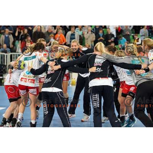 Players of Larvik celebrate victory at semi-final match of EHF Women\'s Champions league between Krim Mercator (SLO) and Larvik (NOR), played in Stozice Arena, Ljubljana, Slovenia on April 13, 2013 