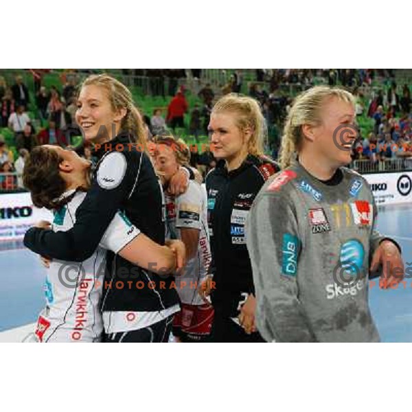 Players of Larvik celebrate victory at semi-final match of EHF Women\'s Champions league between Krim Mercator (SLO) and Larvik (NOR), played in Stozice Arena, Ljubljana, Slovenia on April 13, 2013 