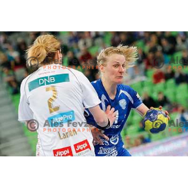 Christin Nina Worz of Krim Mercator and Tonje Larsen of Larvik in action during semi-final match of EHF Women\'s Champions league between Krim Mercator (SLO) and Larvik (NOR), played in Stozice Arena, Ljubljana, Slovenia on April 13, 2013 