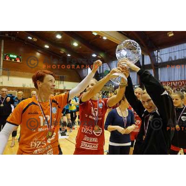 Sergeja Stefanisin and Players of Krim Mercator celebrate victory in Slovenian Handball Cup, played in Galjevica hall, Ljubljana on April 21, 2013 