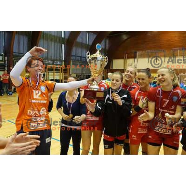 Sergeja Stefanisin and Players of Krim Mercator celebrate victory in Slovenian Handball Cup, played in Galjevica hall, Ljubljana on April 21, 2013 