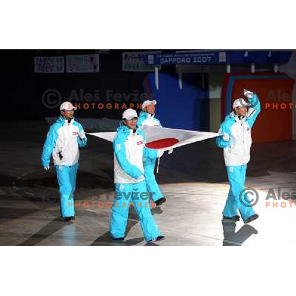 Olympic gold medalists from Japan carrying national flag at the opening ceremony of FIS Nordic World SKI Championships 2007 in Sapporo, Japan