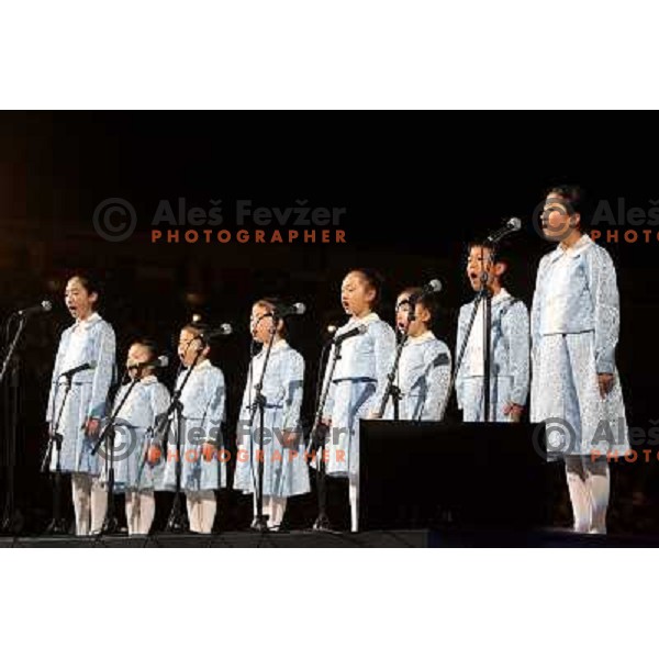 Children choir singing japanese national anthemn at the opening ceremony of FIS Nordic World SKI Championships 2007 in Sapporo, Japan
