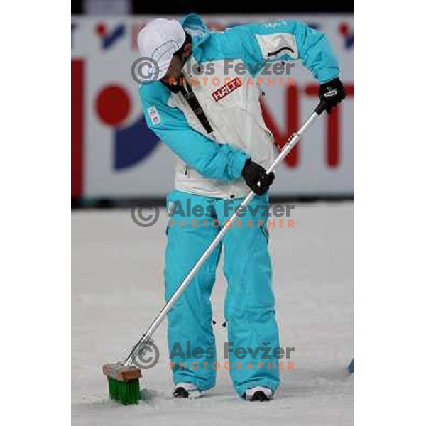 Preparing the track before sprint race in Sapporo Dome at FIS Nordic World SKI Championships 2007 in Sapporo, Japan