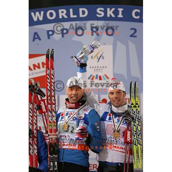 Zorzi (left0 and Pasini with gold medals after winning Men\'s Sprint Relay race at FIS Nordic World SKI Championships 2007 in Sapporo, Japan