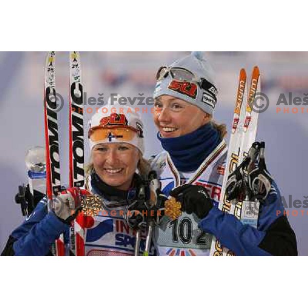 Roponen (left) and Kuitunen at Women\'s Sprint Relay race at FIS Nordic World SKI Championships 2007 in Sapporo, Japan