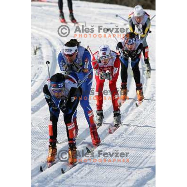 Kuitunen (1) leading in front of Majdic at Ladies Pursuit 7.5 km + 7.5 km at FIS Nordic World SKI Championships 2007 in Sapporo, Japan