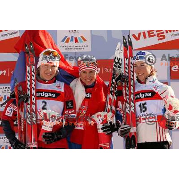 Neumanova, Savialova and Steira (left to right) at winning podium at Ladies Pursuit 7.5 km + 7.5 km at FIS Nordic World SKI Championships 2007 in Sapporo, Japan