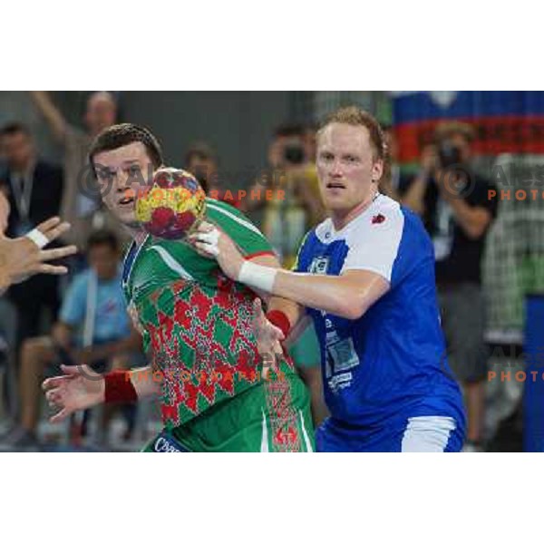 Sergey Rutenka of Belarus and Miha Zvizej during handball match Slovenia-Belarus in last round of qualification for European Championship 2014, played in Stozice Arena, Ljubljana, Slovenia on June 16, 2013 