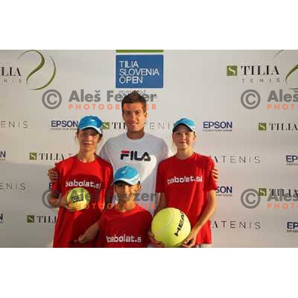 Aljaz Bedene in players corner with fans after victory in first round of Tilia Slovenia Open-ATP Challenger Tour in Portoroz, Slovenia on July 2, 2013 