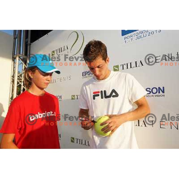 Aljaz Bedene in players corner with fans after victory in first round of Tilia Slovenia Open-ATP Challenger Tour in Portoroz, Slovenia on July 2, 2013 
