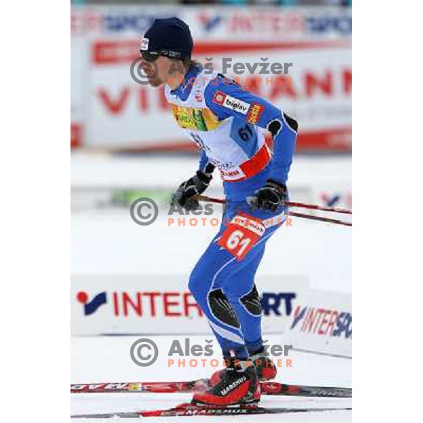 Nejc brodar of Slovenia racing in snow storm at Cross Country 15 km individual race at FIS Nordic Ski WC Sapporo, Japan