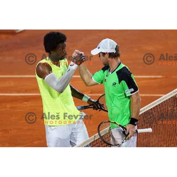 Gael Monfils of France and Blaz Kavcic of Slovenia playing in second round of ATP Vegeta Croatia Open tennis tournament in Umag, Croatia on July 24,2013 