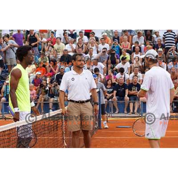 Gael Monfils of France and Blaz Kavcic of Slovenia playing in second round of ATP Vegeta Croatia Open tennis tournament in Umag, Croatia on July 24,2013 