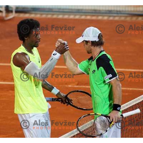 Gael Monfils of France and Blaz Kavcic of Slovenia playing in second round of ATP Vegeta Croatia Open tennis tournament in Umag, Croatia on July 24,2013 