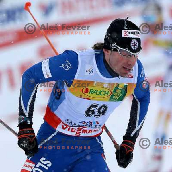 Michal Malak racing in snow storm at Cross Country 15 km individual race at FIS Nordic Ski WC Sapporo, Japan