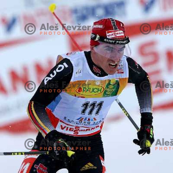 Rene Sommerfeldt racing in snow storm at Cross Country 15 km individual race at FIS Nordic Ski WC Sapporo, Japan