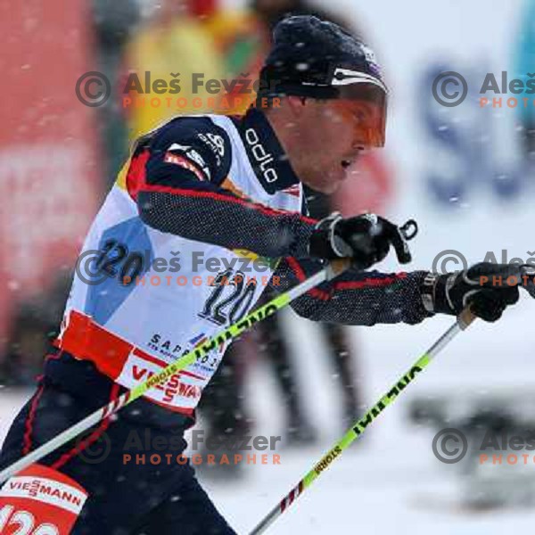 Vincent Vittoz racing in snow storm at Cross Country 15 km individual race at FIS Nordic Ski WC Sapporo, Japan
