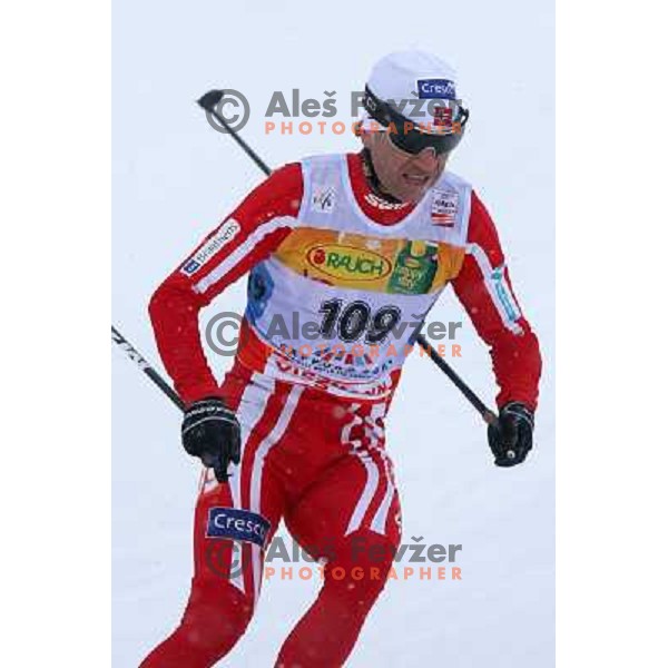 Bjoerndalen racing in snow storm at Cross Country 15 km individual race at FIS Nordic Ski WC Sapporo, Japan