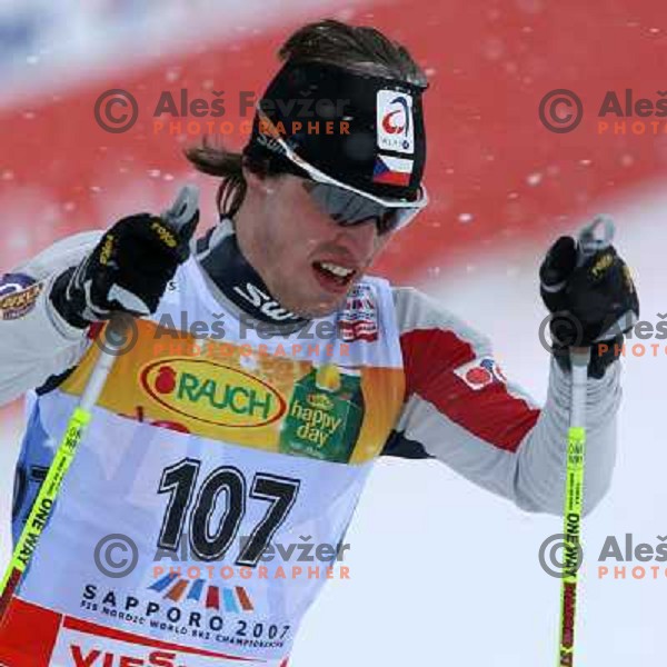 Martin Koukal racing in snow storm at Cross Country 15 km individual race at FIS Nordic Ski WC Sapporo, Japan