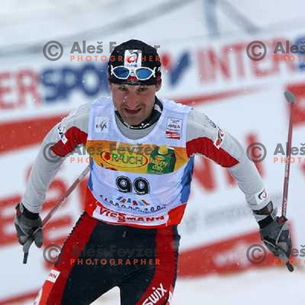 Jiri Magal racing in snow storm at Cross Country 15 km individual race at FIS Nordic Ski WC Sapporo, Japan