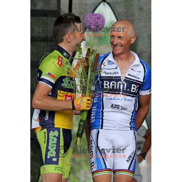 Tadej Valjavec, member of Sava Kranj cycling team finished his racing cycling career in his hometown Kranj in Slovenia during Grand Prix of Kranj EuroTour race on July 27,2013 and Bojan Ropret 