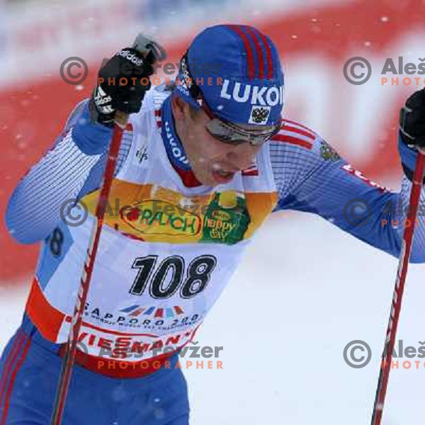 Sergej Shiraiev racing in snow storm at Cross Country 15 km individual race at FIS Nordic Ski WC Sapporo, Japan