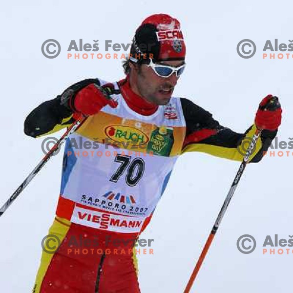 Vicente Vilarrubla racing in snow storm at Cross Country 15 km individual race at FIS Nordic Ski WC Sapporo, Japan