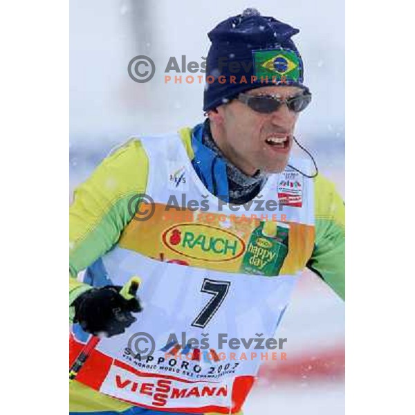 Helio Freitas racing in snow storm at Cross Country 15 km individual race at FIS Nordic Ski WC Sapporo, Japan