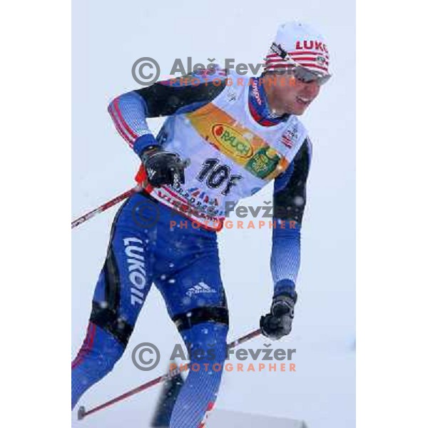 Nikolaj Pankratov racing in snow storm at Cross Country 15 km individual race at FIS Nordic Ski WC Sapporo, Japan