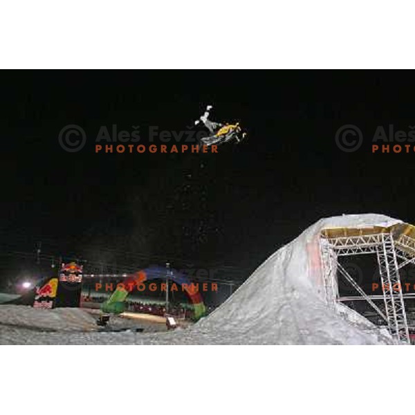 Heath Frisby in the air at Red Bull snowmobile show HIT Ski Legends Challenge Race in Kranjska gora, Slovenia hosted by Jure Kosir