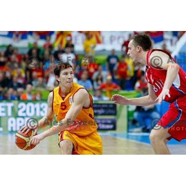 Vlado Ilievski Of Macedonia and Bogdan Bogdanovic of Serbia during basketball match Serbia and Macedonia in Preliminary round group B at EuroBasket 2013, played in Arena Podmezakla on September 6th, Jesenice, Slovenia 