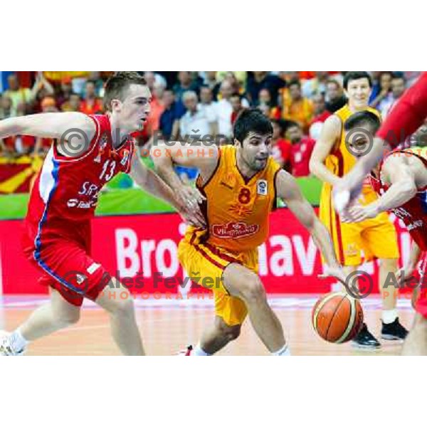 Danilo Andjusic of Serbia and Vojdan Stojanovski of Macedonia during basketball match between Serbia and Macedonia in Preliminary round group B at EuroBasket 2013, played in Arena Podmezakla on September 6th, Jesenice, Slovenia 