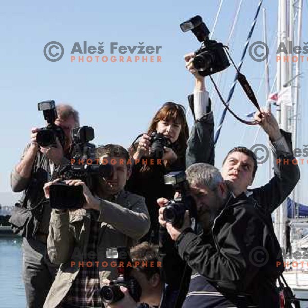 Photographers shooting Team 44 first with Black Beauty (RC 44 yacht by Russell Coutts) first time on the water in Portorose, Slovenia