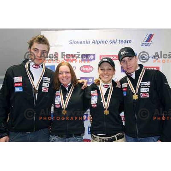 Miha Kuerner, Marusa Ferk, Ilka Stuhec and Matic Skube (left to right) with medals from World Ski Junior Championships in Flachau, Austria on March 12,2007