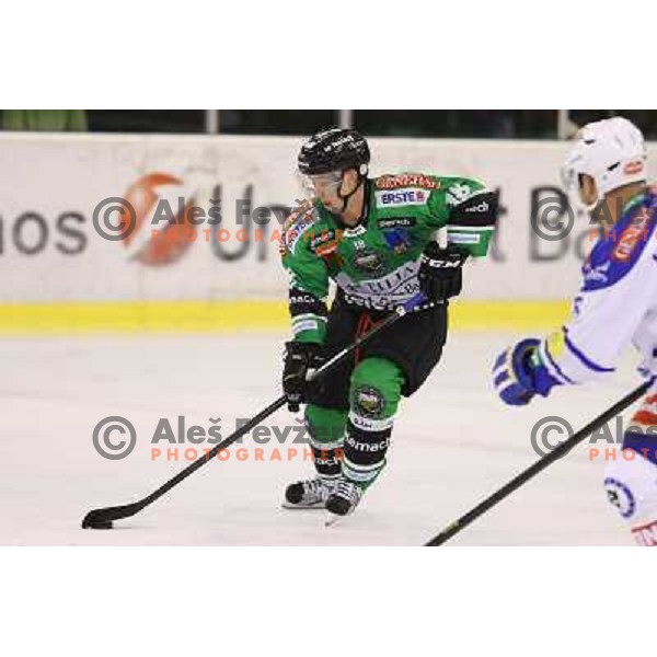 Ken Ograjensek of Telemach Olimpija in action during ice-hockey match Telemach Olimpija- VSV in round 14 of Ebel league 2013/2014, played in Hala Tivoli, Ljulbjana, Slovenia on October 20,2013 