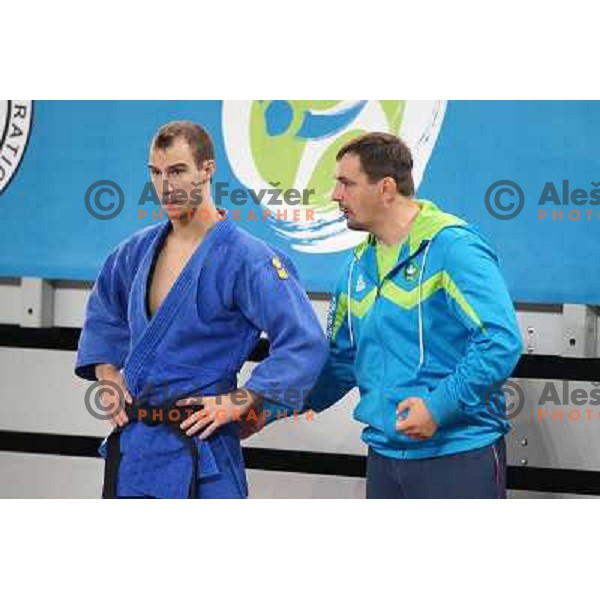 Luka Kuralt of Slovenia and coach Brod in action during Judo World Championships Juniors in Arena Stozice, Ljubljana, Slovenia on October 24, 2013 