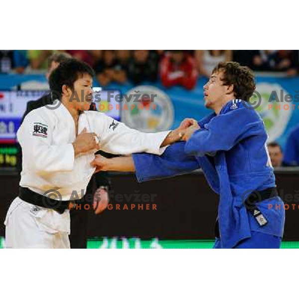 Adrian Gomboc of Slovenia and Yuuki Hashiguchi of Japan in action during Judo World Championships Juniors in Arena Stozice, Ljubljana, Slovenia on October 27, 2013 